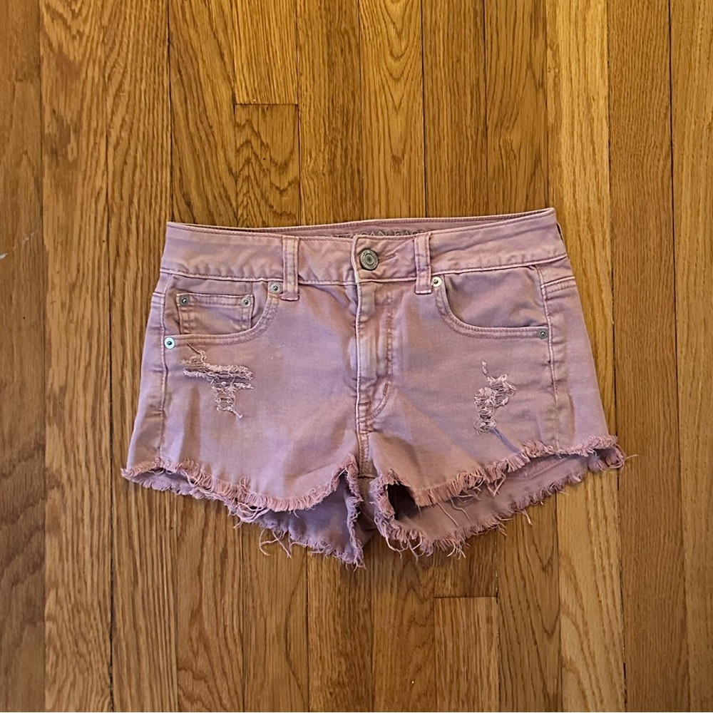 Pink mid rise jean shorts
